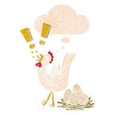 Cartoon Chicken Laying Egg And Thought Bubble In Retro Textured Style Royalty Free Stock Photo