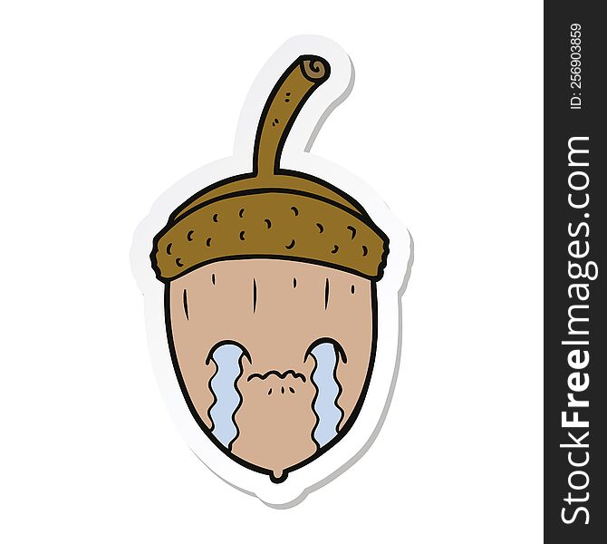 sticker of a cartoon crying acorn