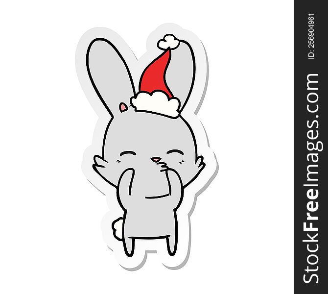 curious bunny hand drawn sticker cartoon of a wearing santa hat. curious bunny hand drawn sticker cartoon of a wearing santa hat