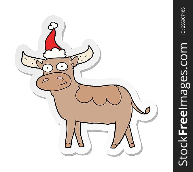 hand drawn sticker cartoon of a bull wearing santa hat
