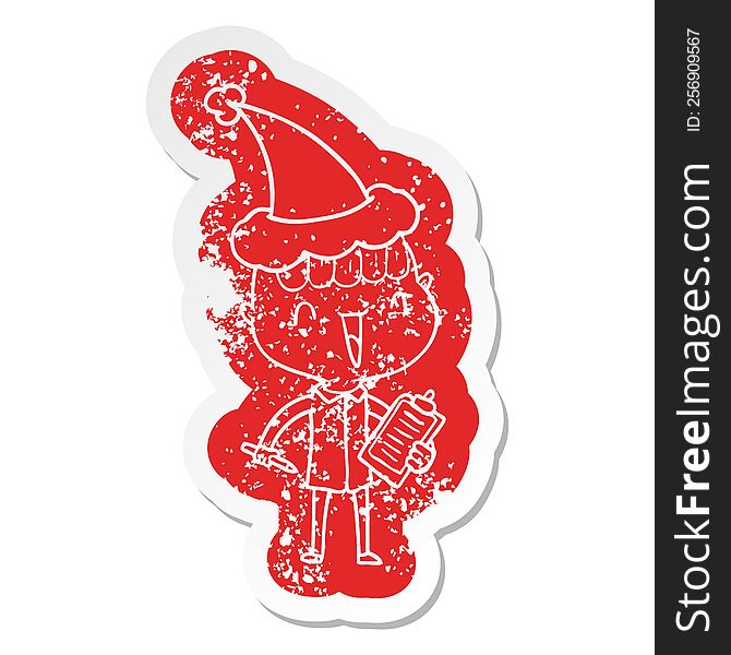 quirky cartoon distressed sticker of a happy boy surprised wearing santa hat