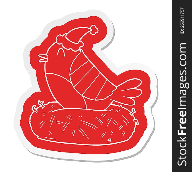 Cartoon  Sticker Of A Bird Sitting On Nest Wearing Santa Hat