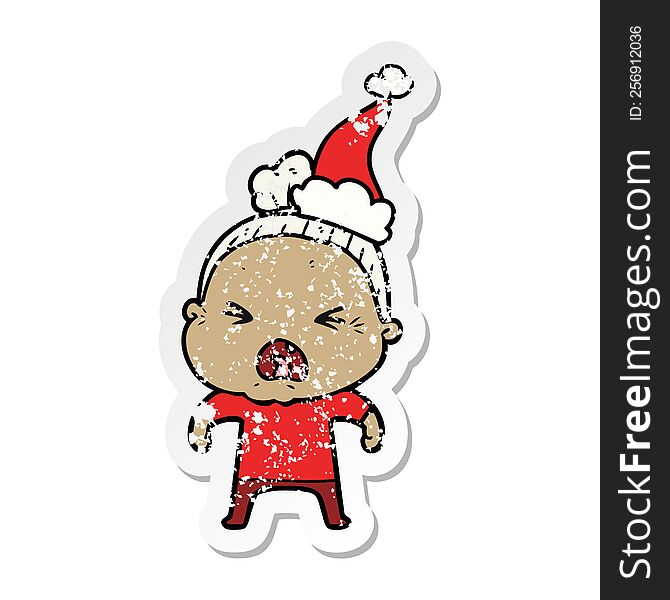 hand drawn distressed sticker cartoon of a angry old woman wearing santa hat