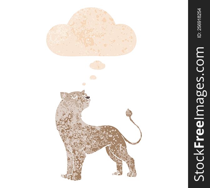 cartoon lioness with thought bubble in grunge distressed retro textured style. cartoon lioness with thought bubble in grunge distressed retro textured style