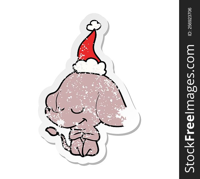 Distressed Sticker Cartoon Of A Smiling Elephant Wearing Santa Hat