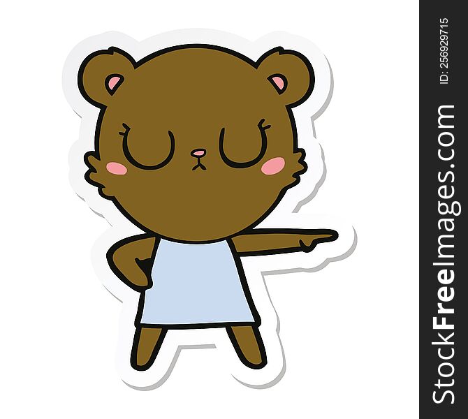 Sticker Of A Peaceful Cartoon Bear In Dress Pointing