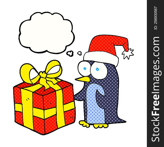 freehand drawn thought bubble cartoon christmas penguin with present