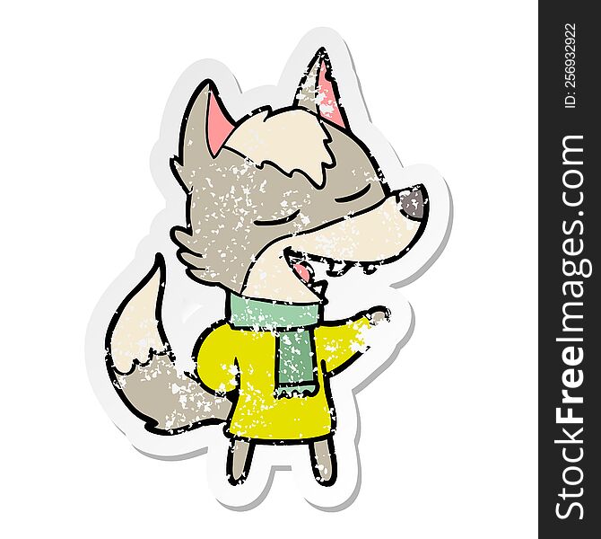 distressed sticker of a cartoon wolf in scarf laughing