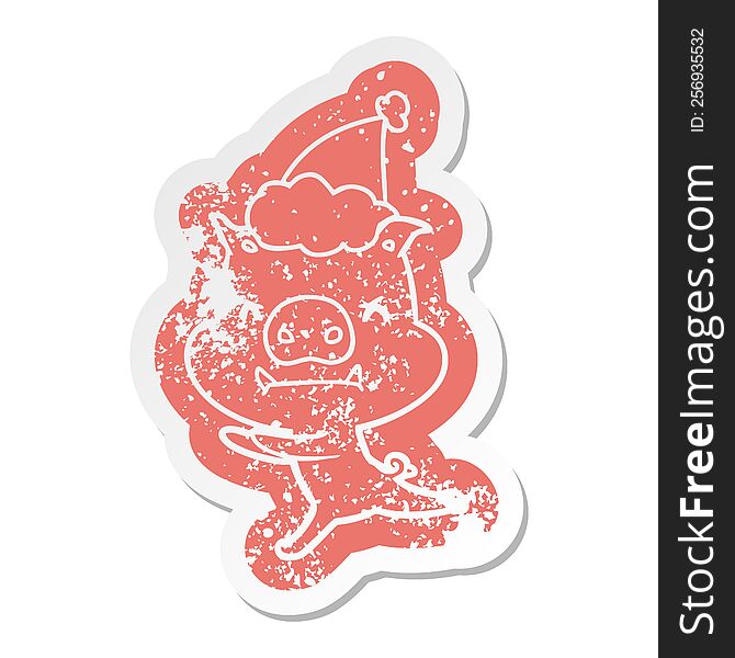 Angry Cartoon Distressed Sticker Of A Pig Wearing Santa Hat