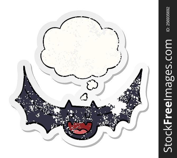 cartoon bat and thought bubble as a distressed worn sticker