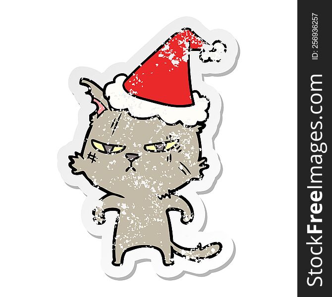 Tough Distressed Sticker Cartoon Of A Cat Wearing Santa Hat