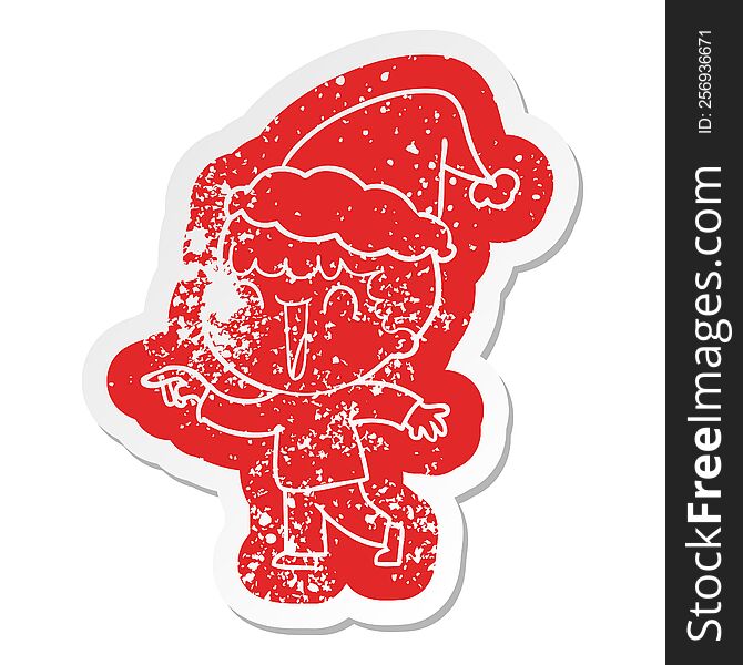 laughing quirky cartoon distressed sticker of a man pointing wearing santa hat