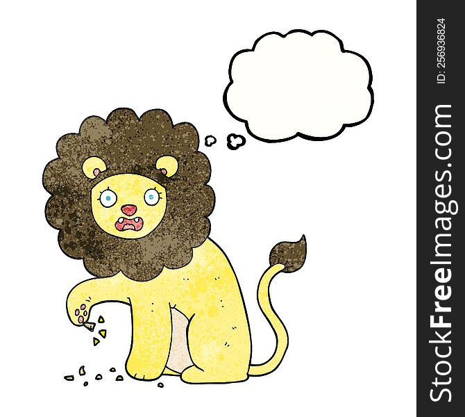 freehand drawn thought bubble textured cartoon lion with thorn in foot