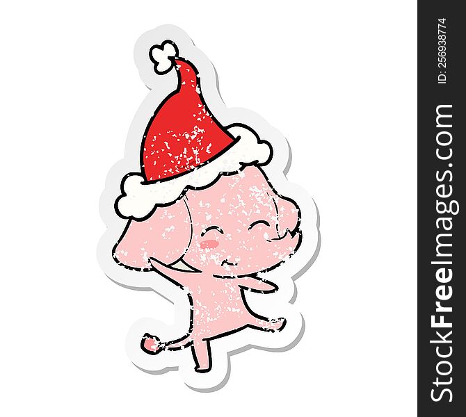 cute hand drawn distressed sticker cartoon of a elephant dancing wearing santa hat
