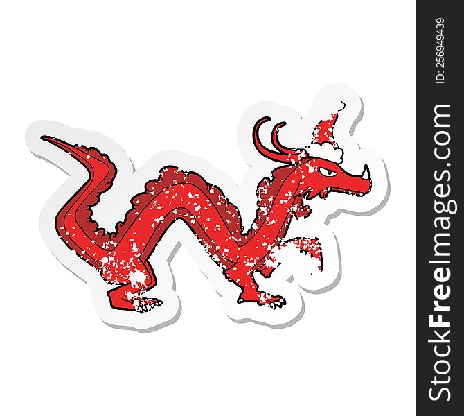 hand drawn distressed sticker cartoon of a dragon wearing santa hat