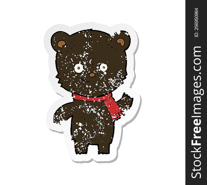 Retro Distressed Sticker Of A Cartoon Black Bear Waving