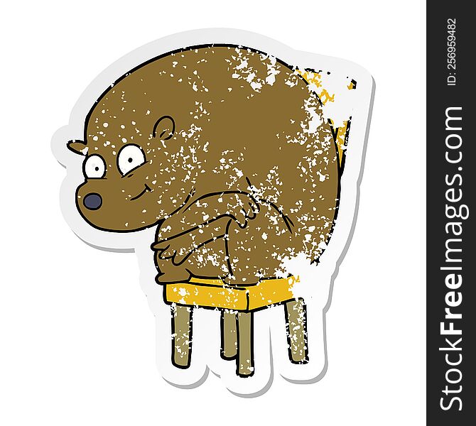 distressed sticker of a cartoon bear sitting on chair
