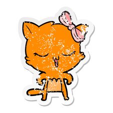 Distressed Sticker Of A Cartoon Cat With Bow On Head Stock Photos