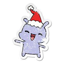 Christmas Distressed Sticker Cartoon Of Kawaii Alien Stock Photo
