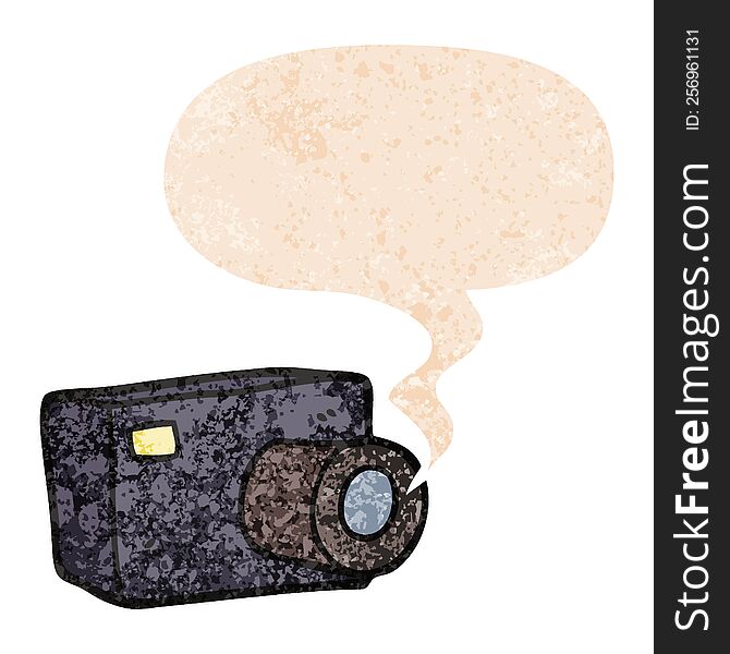 cartoon camera with speech bubble in grunge distressed retro textured style. cartoon camera with speech bubble in grunge distressed retro textured style