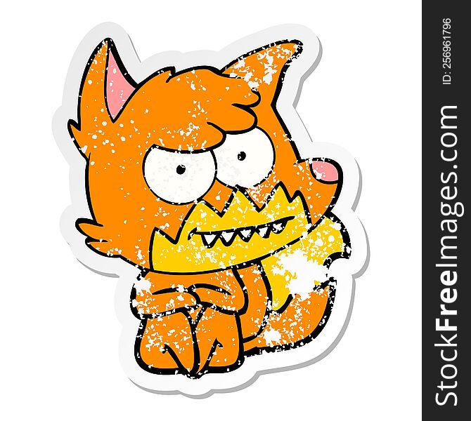 distressed sticker of a cartoon grinning fox sitting