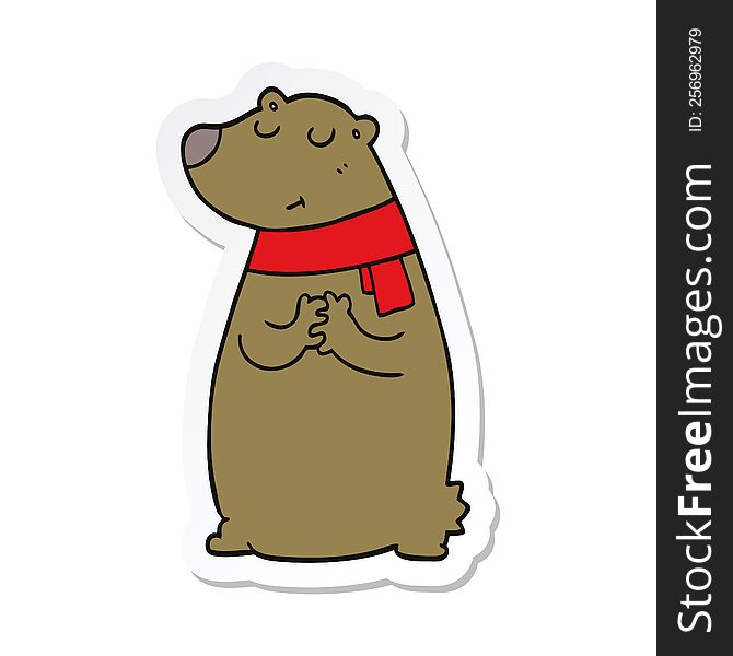 sticker of a cartoon bear wearing scarf