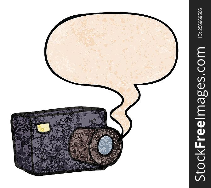 cartoon camera with speech bubble in retro texture style