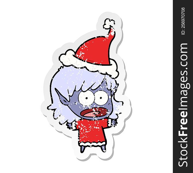 distressed sticker cartoon of a shocked elf girl wearing santa hat