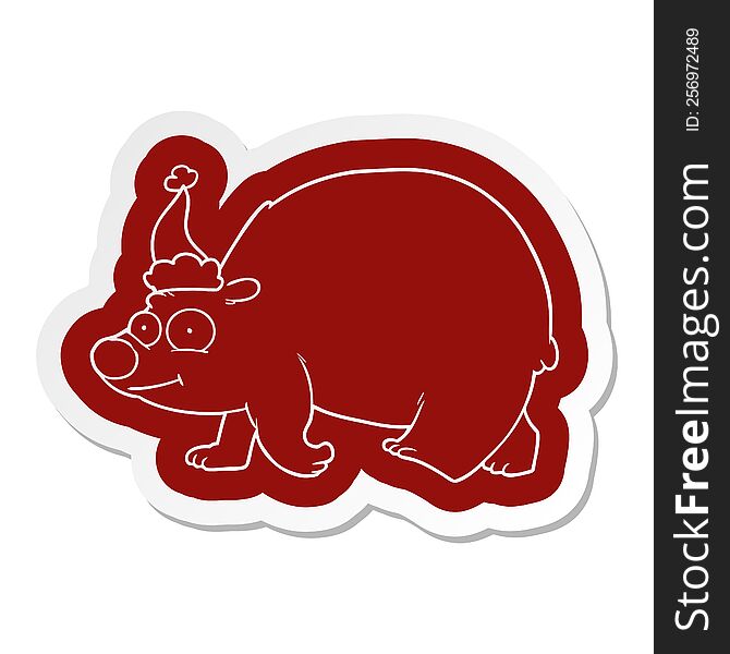 quirky cartoon  sticker of a walking polar bear wearing santa hat