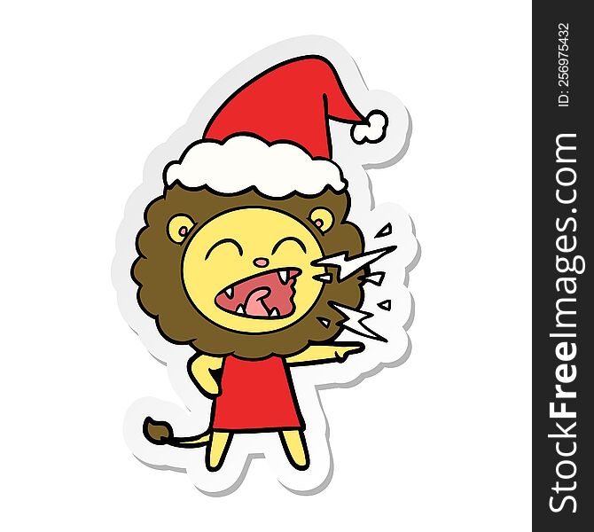 Sticker Cartoon Of A Roaring Lion Girl Wearing Santa Hat