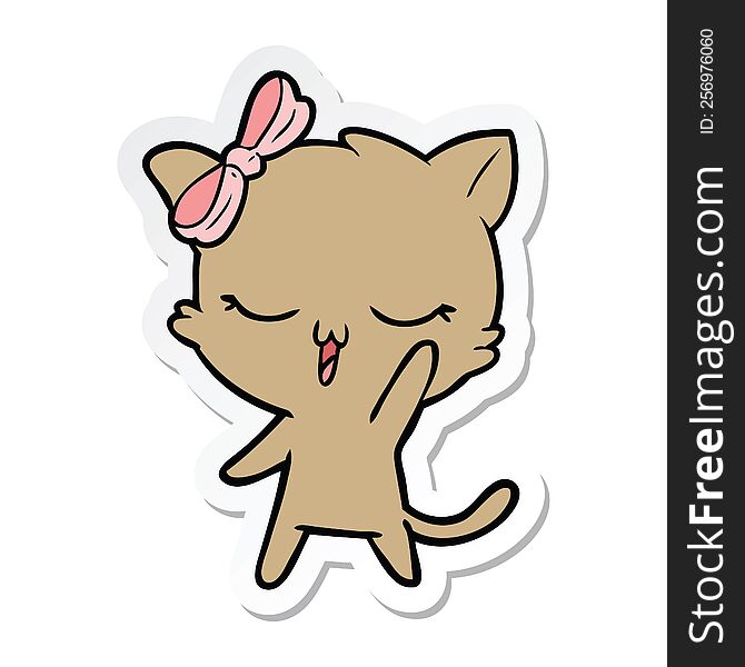 sticker of a cartoon cat with bow on head waving