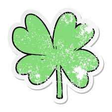 Distressed Sticker Of A Cartoon Four Leaf Clover Stock Image