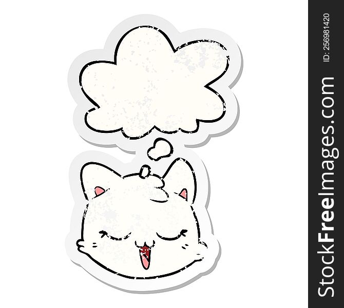 cartoon cat face with thought bubble as a distressed worn sticker