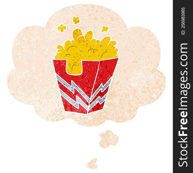 cartoon box of popcorn with thought bubble in grunge distressed retro textured style. cartoon box of popcorn with thought bubble in grunge distressed retro textured style