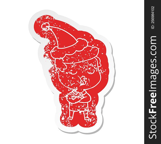 quirky cartoon distressed sticker of a man talking wearing santa hat