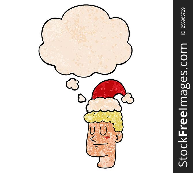 cartoon man wearing christmas hat with thought bubble in grunge texture style. cartoon man wearing christmas hat with thought bubble in grunge texture style