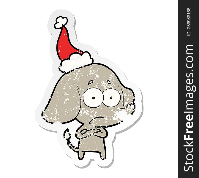 hand drawn distressed sticker cartoon of a unsure elephant wearing santa hat
