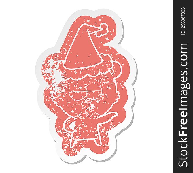 Bored Polar Bear Cartoon Distressed Sticker Of A Wearing Santa Hat
