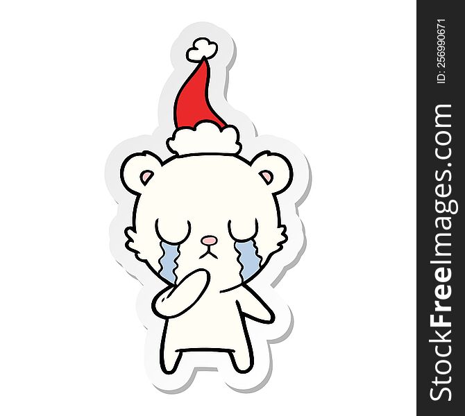 crying polar bear hand drawn sticker cartoon of a wearing santa hat. crying polar bear hand drawn sticker cartoon of a wearing santa hat