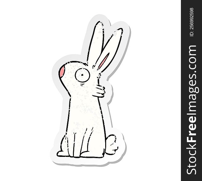 Distressed Sticker Of A Cartoon Startled Rabbit