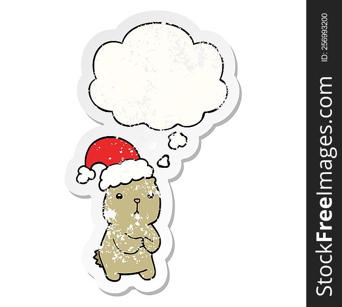 cartoon christmas bear worrying with thought bubble as a distressed worn sticker