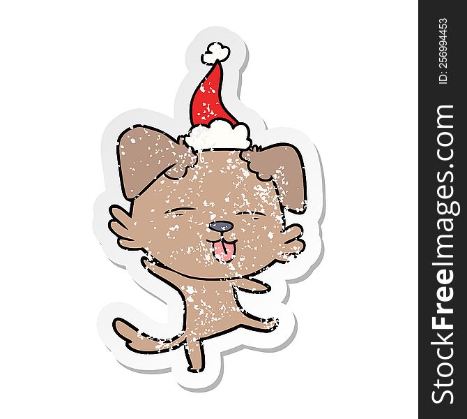 Distressed Sticker Cartoon Of A Dancing Dog Wearing Santa Hat