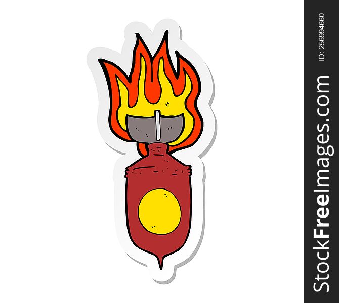 sticker of a cartoon burning bomb