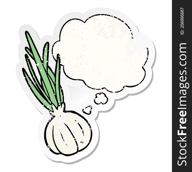 cartoon garlic with thought bubble as a distressed worn sticker