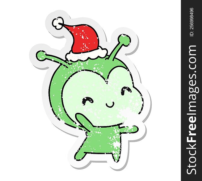 hand drawn christmas distressed sticker cartoon of kawaii alien