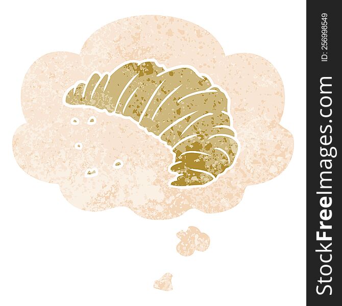 cartoon croissant with thought bubble in grunge distressed retro textured style. cartoon croissant with thought bubble in grunge distressed retro textured style