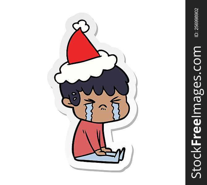 Sticker Cartoon Of A Boy Crying Wearing Santa Hat