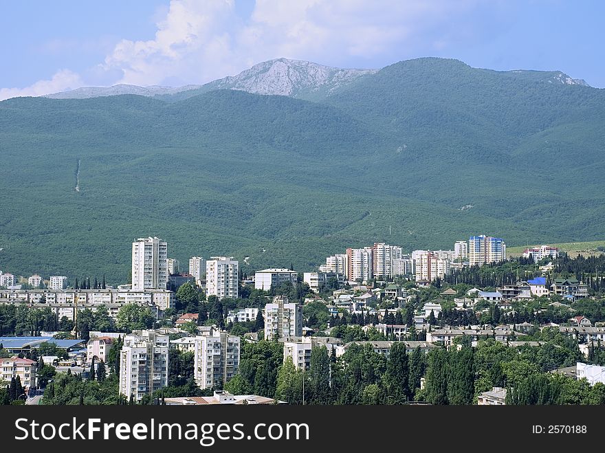 Modern city located in an environment of mountains. (Alushta - the Crimean mountains)