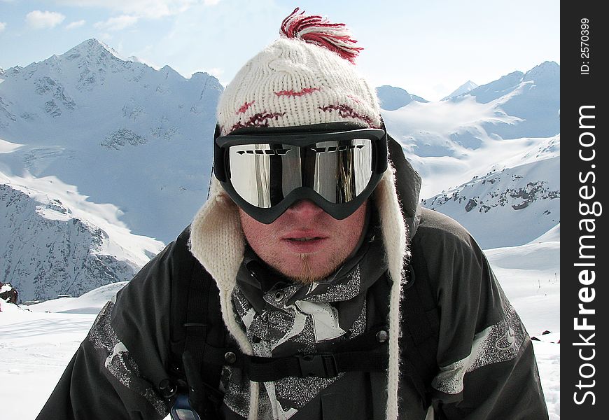 Portrait of snowboarder in goggles. Portrait of snowboarder in goggles