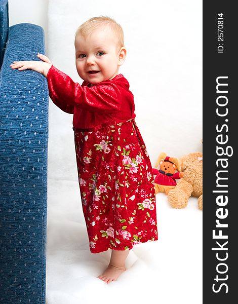 Little baby girl in formal red dress. Little baby girl in formal red dress